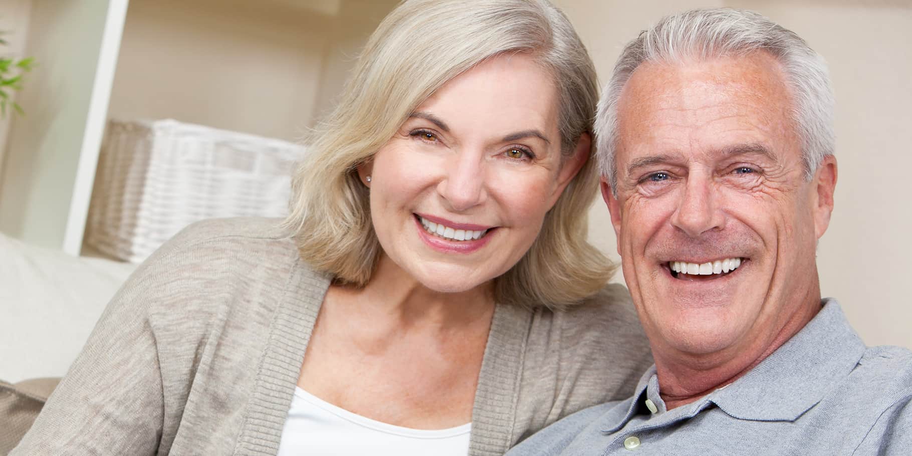 A smiling senior couple.